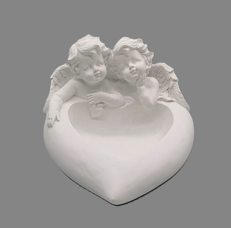 Andělé na srdci svícen