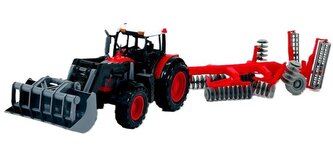 Traktor z turem i bronami