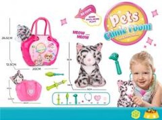 Kotek w torbie z akcesoriami