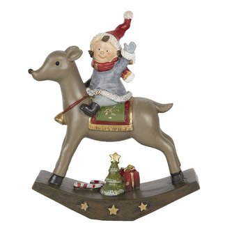 Děvčátko na houpacím jelínkovi