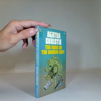 The man in the brown suit