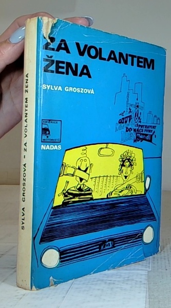 za volantem žena