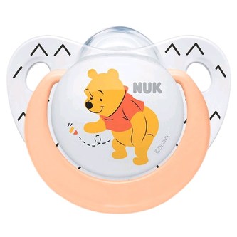 Šidítko NUK Trendline Medvídek Pú 0-6m meruňkové