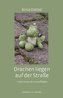 Drachen liegen auf der Straße