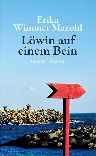 Löwin auf einem Bein